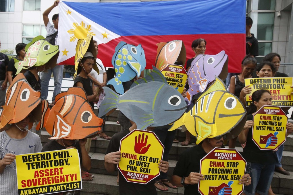 Activists protest at the Chinese embassy in Manila. Photo: Reuters