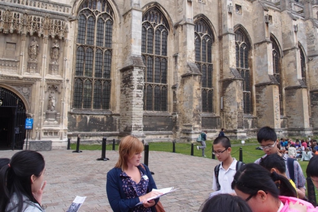 A British teacher introduces Canterbury Cathedral in England to students from St Paul's Co-educational College in Hong Kong, as part of a cultural enrichment tour.