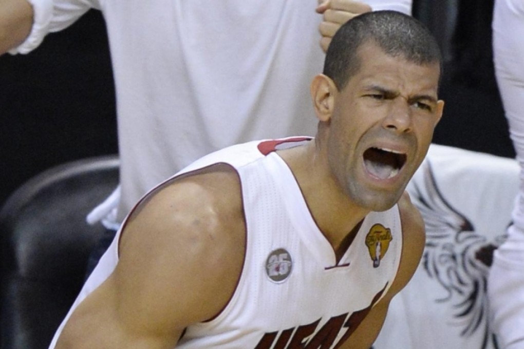 Heat's Shane Battier reacts after scoring against Spurs. Photo: EPA
