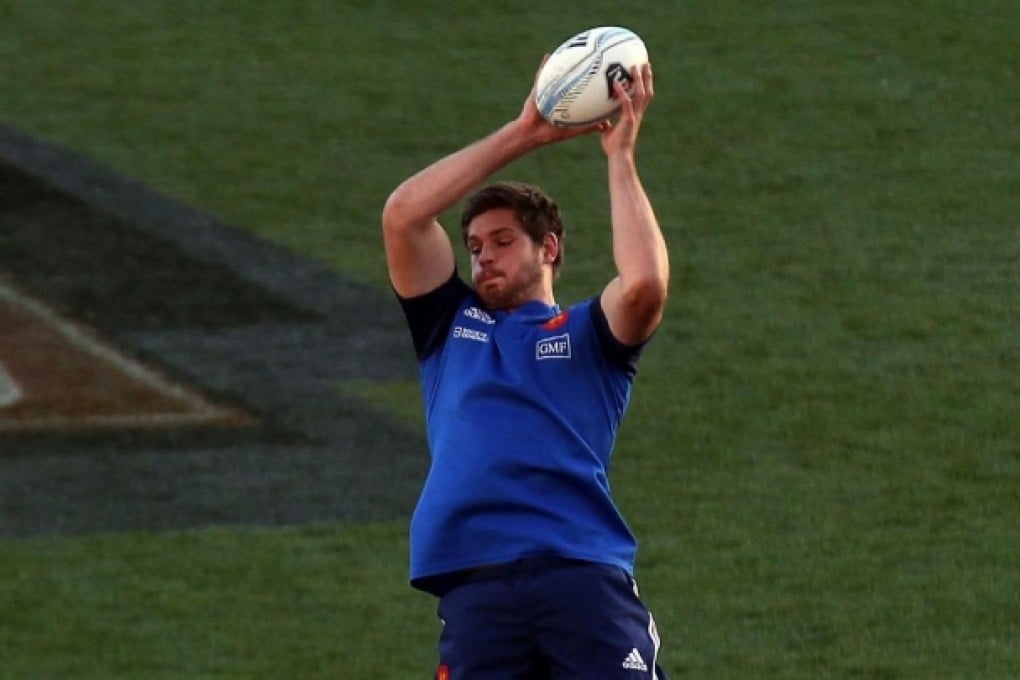 Alexandre Flanquart of France takes the lineout ball during the captain's run yesterday. Photo: AFP