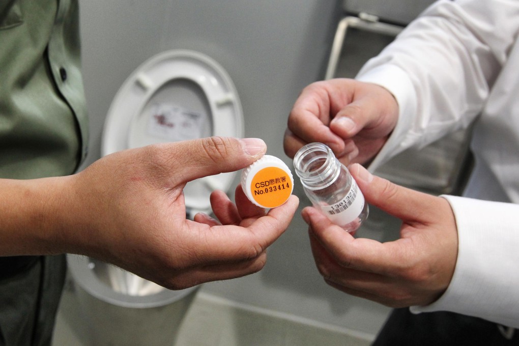 Each bottle is numbered and the process is monitored so that officers and inmates cannot collude. Photo: K.Y. Cheng