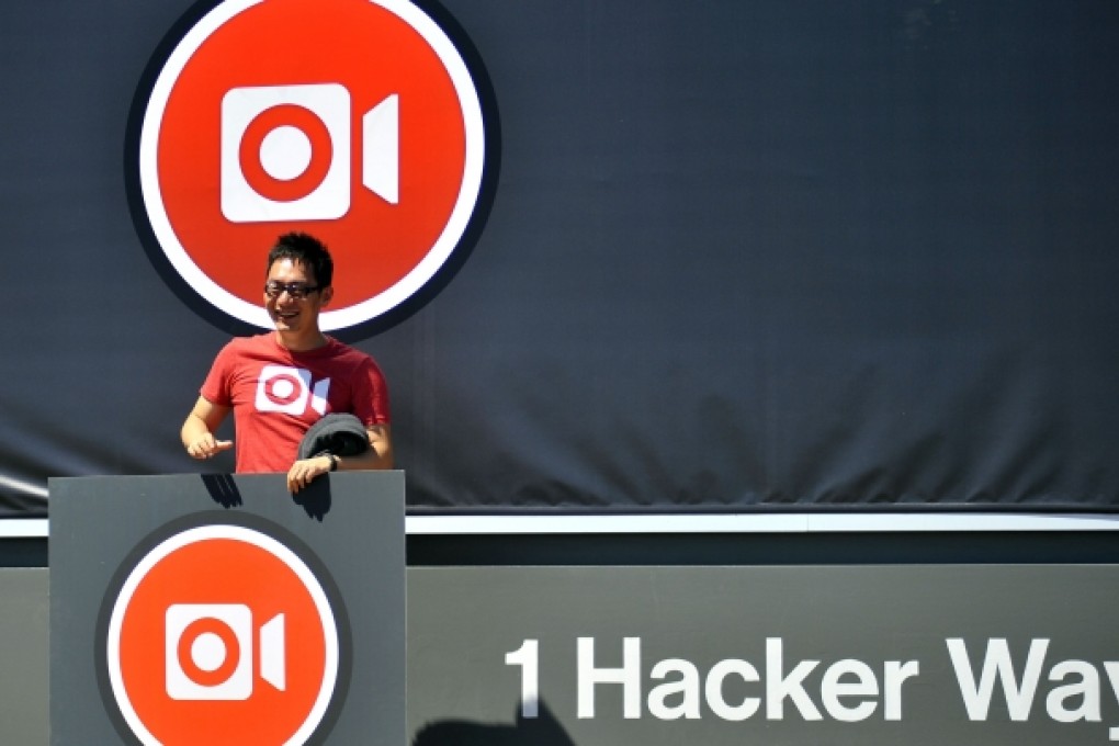 An Instagram iOS engineer poses after a media event at Facebook's headquarters to announce that it would add smartphone video-sharing to its Instagram photo-based social network. Photo: AFP