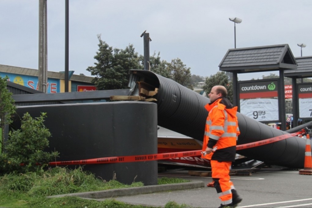 A fallen supermarket sign is seen in Wellington, New Zealand. Photo: Xinhua