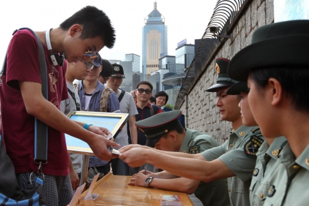 Henry Cheung, left, lined up all night for tickets. Photo: Nora Tam