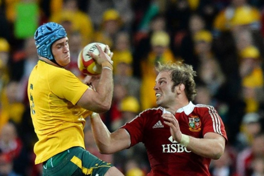 Australia captain James Horwill and British & Irish Lions counterpart Alun Wyn Jones battle for the ball in the Lions' 23-21 win. Photo: AFP