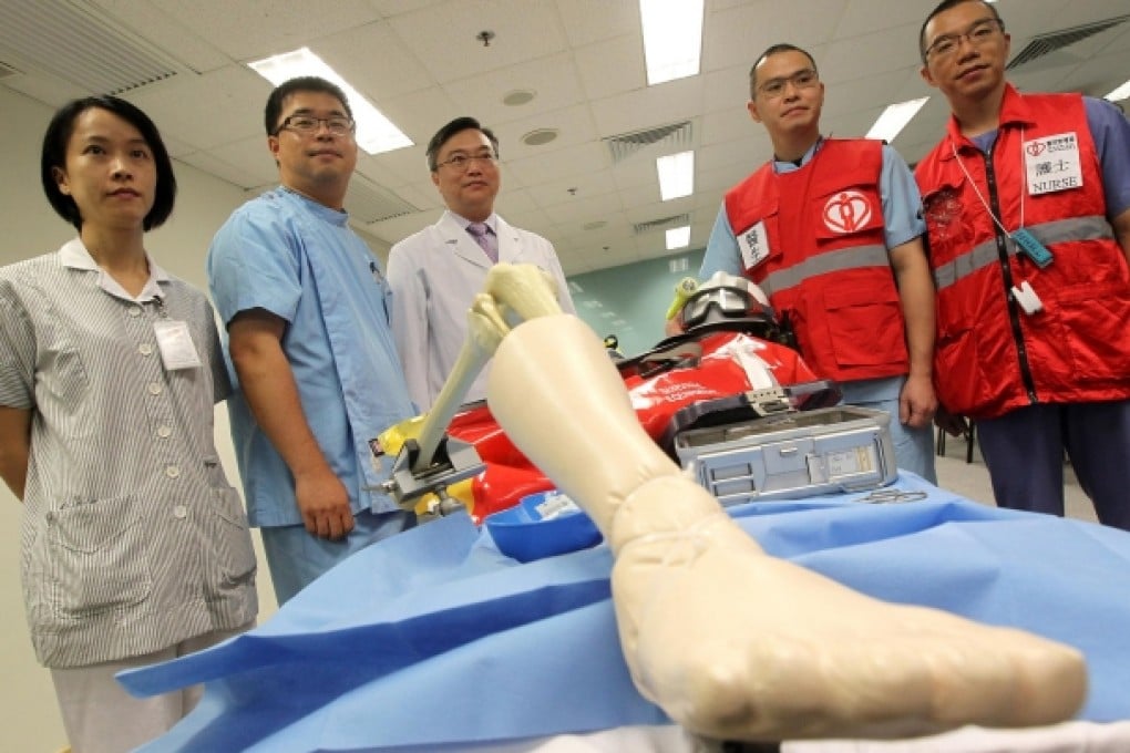 Dr Chow Yuk-yin, centre, with some of the team members, from left, nurse Ng Ching-ha, Dr Chan Ping-tak, Dr Lai Ching-hon and nurse William Chan Yuk-wing. Photo: K.Y. Cheng