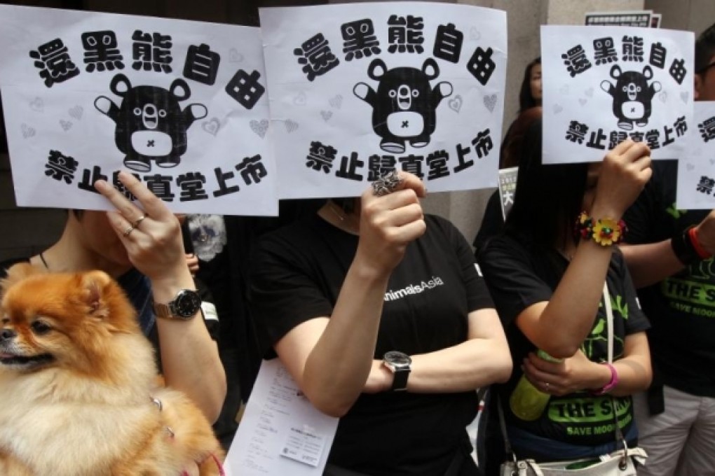 Protesters went on a march in April to demand banning bear bile imports to Hong Kong and save the moon bear. Photo: Sam Tsang
