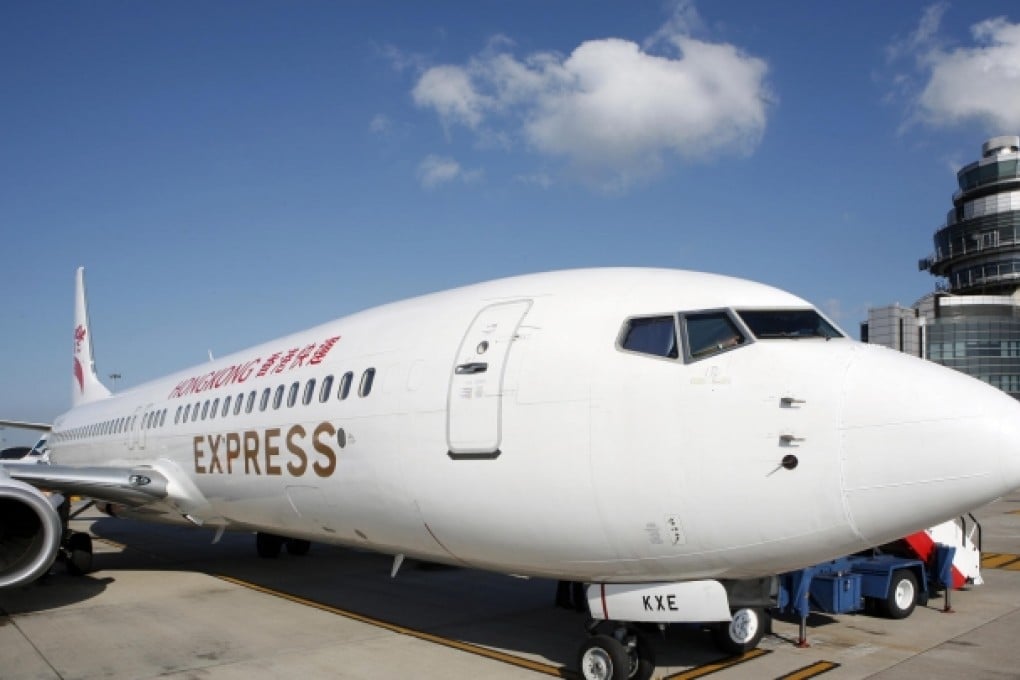 At least four aircraft operated by Hong Kong Express will be reconfigured to enable it to enter the low-cost carrier arena. Photo: SCMP
