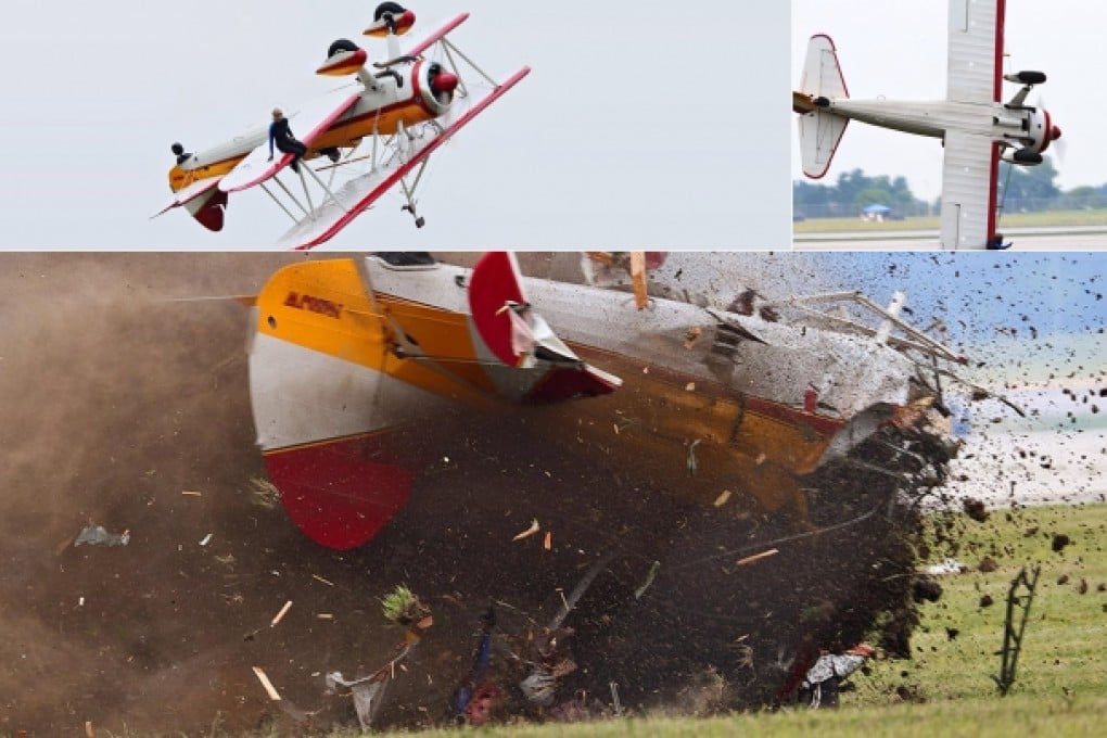 Jane Wicker sits on the wing just before the 450 HP Stearman biplane loses control and crashes and explodes at an air show in Dayton Ohio. Wicker and the pilot died, but there were no casualties on the ground. Photos: AP