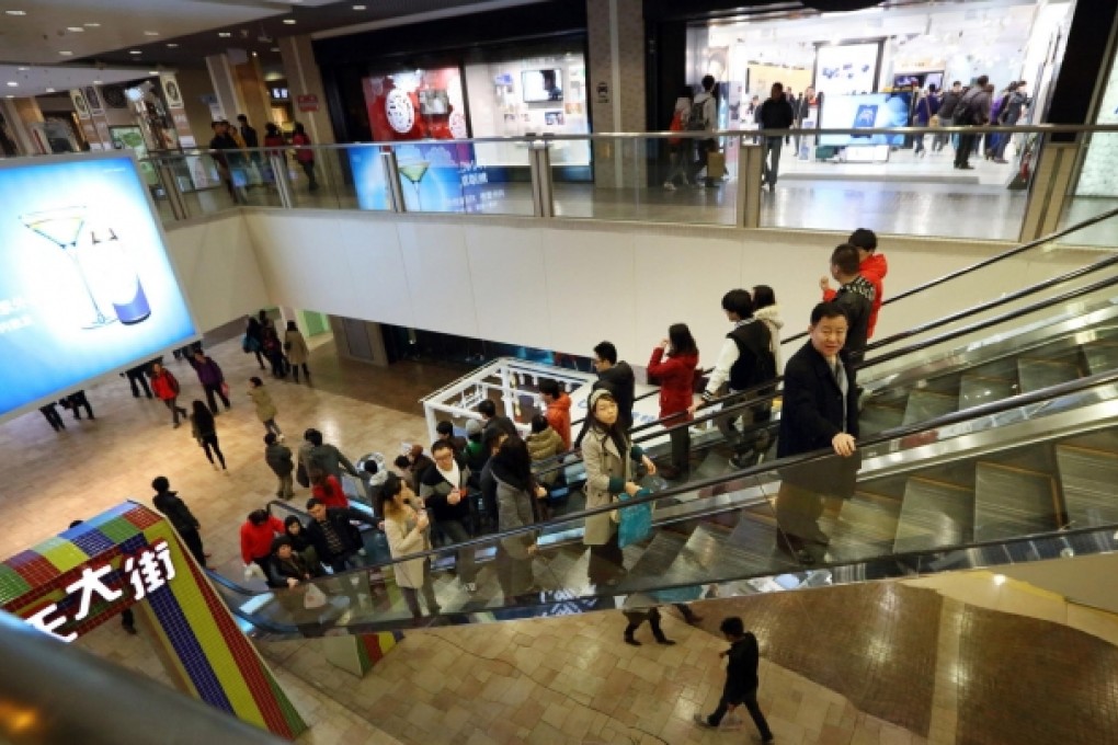 A drop in the proportion of retailers reporting gains in spending growth dented overall economic strength. Photo: Bloomberg