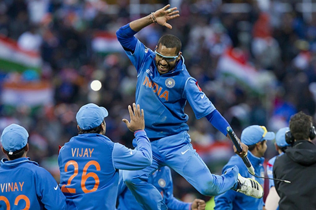 India's Shikhar Dhawan (top) celebrates with teammates after their win over England. Photo: AP