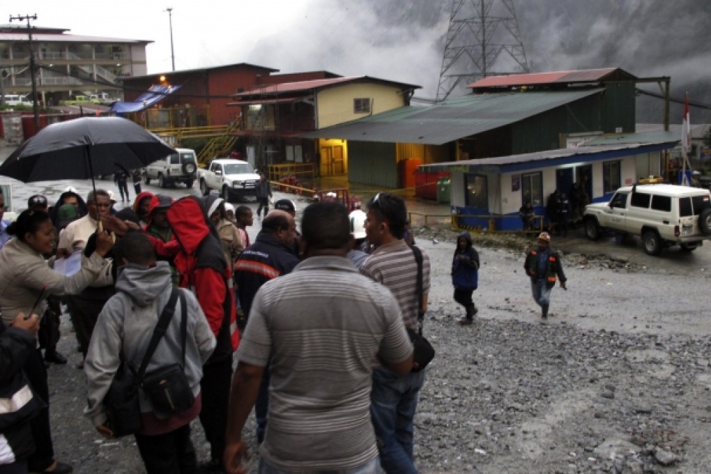 Freeport-McMoRan workers gather in a May 15 protest after an accident where 39 workers were trapped when a tunnel collapsed. Photo: Reuters