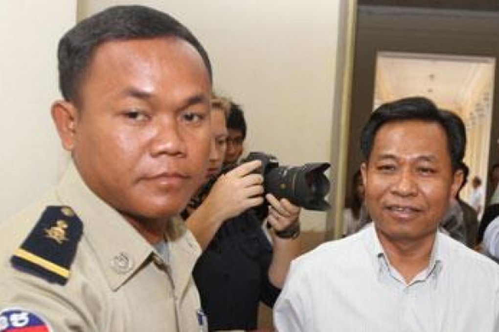 Chhuk Bundith (left), the former governor of Bavet town in southeastern Cambodia. Photo: AP