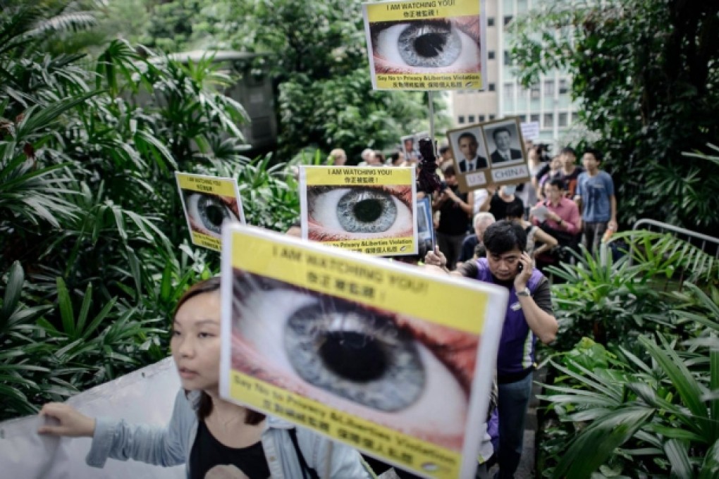 Protesters supporting Edward Snowden march to the US consulate in Hong Kong during the early days of his stay in the city. Photo: AFP