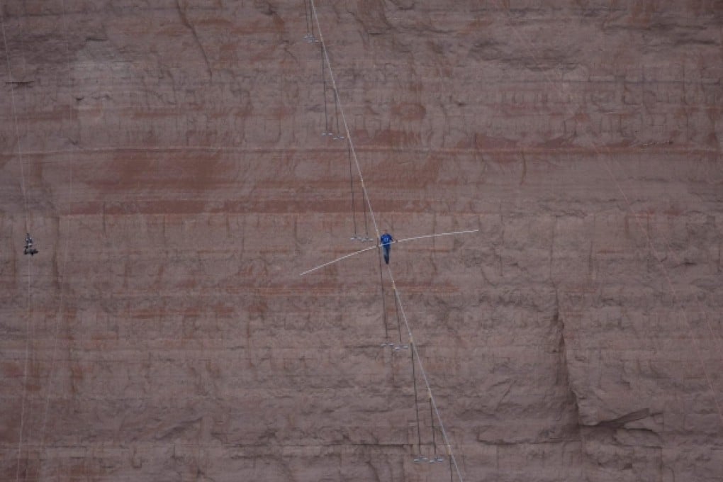 An image released by the Discovery Channel shows Nik Wallenda balancing above the Little Colorado River as he made his 23-minute crossing. Photo: EPA