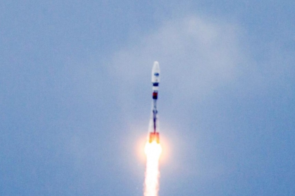 A Russian Soyouz rocket carrying the four satellites is launched from Kourou space base. Photo: AFP