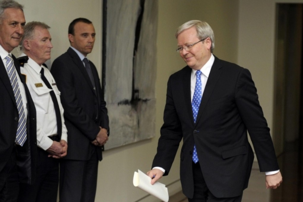 Kevin Rudd arrives for the Labor Party leadership ballot. He won by 57 votes to 45, and now faces a general election in September. Photo: EPA