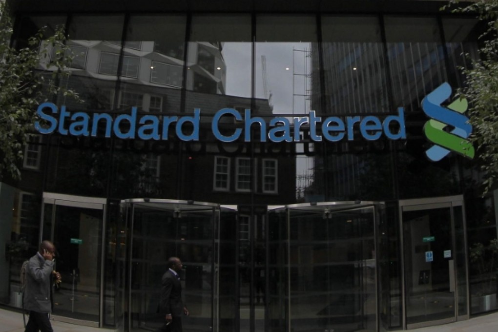 Standard Chartered said income for the first half was expected to grow in the mid-single digits year-on-year. Photo: AP