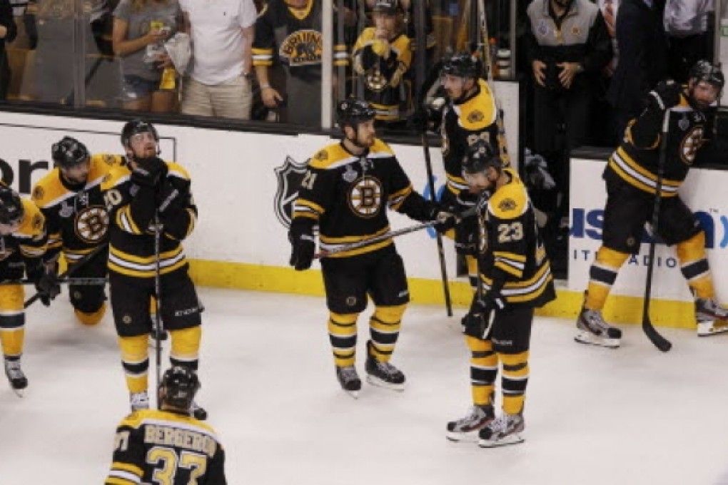 Boston Bruins members react after losing to the Chicago Blackhawks in Game 6 of their NHL Stanley Cup Finals. Photo: Reuters