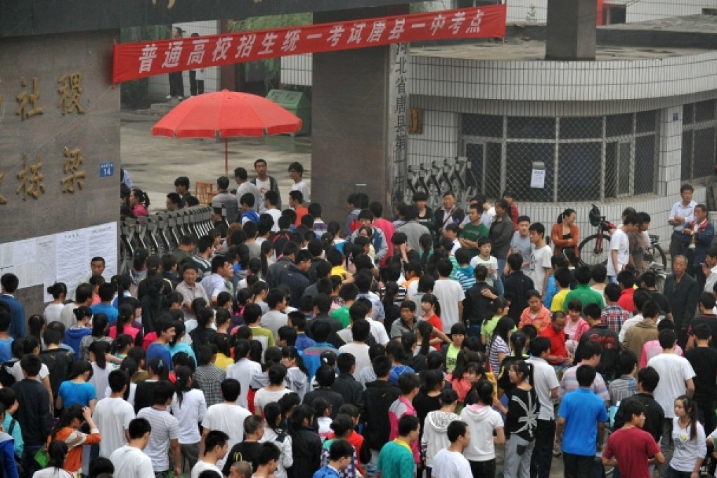 Examinees arrive to take the national college entrance exam. Photo: Xinhua