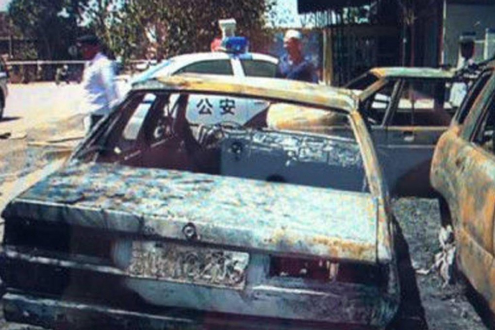 Wreckage from yesterday’s violence in Xinjiang. Photo: SCMP