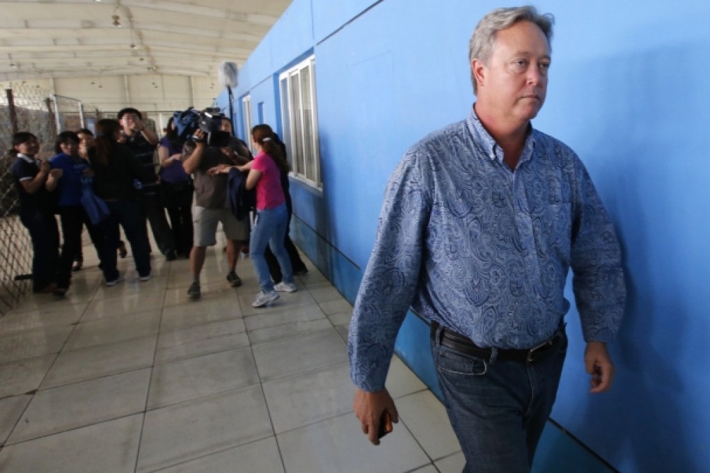 Chip Starnes, president of Florida-based Speciality Medical Supplies, returns to the room where he had been locked up after giving a news conference. Photo: Reuters