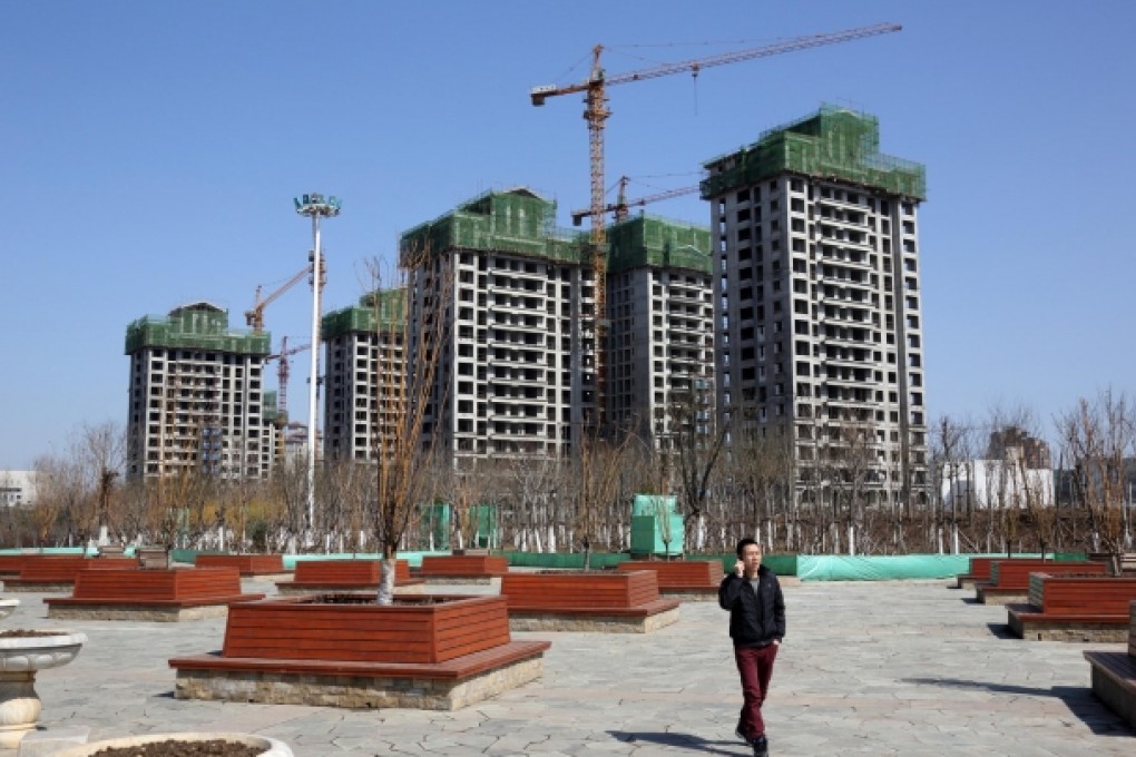 Modern Land has 14 projects in a number of mainland cities. Like other developers, it is finding it harder to gain financing. Photo: Bloomberg