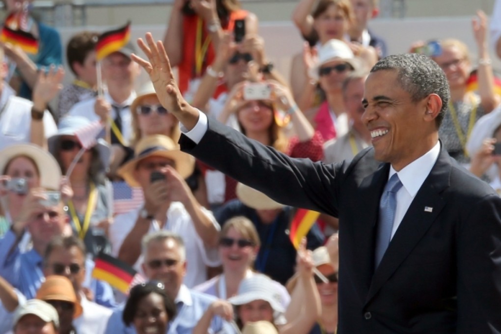 Obama is still popular abroad, drawing enthusiastic response from the crowd as he delivered a speech at the Brandenburg Gate in Berlin. But he is not and never was feared. Photo: AP