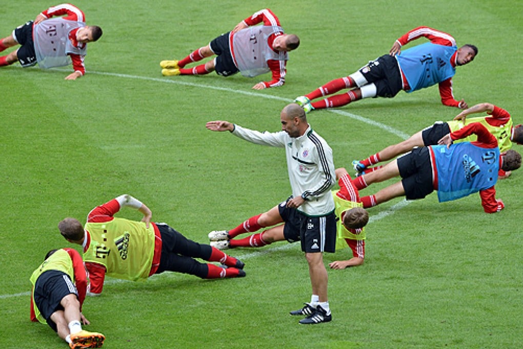 Pep Guardiola takes part in the year's first training session. Photo: EPA