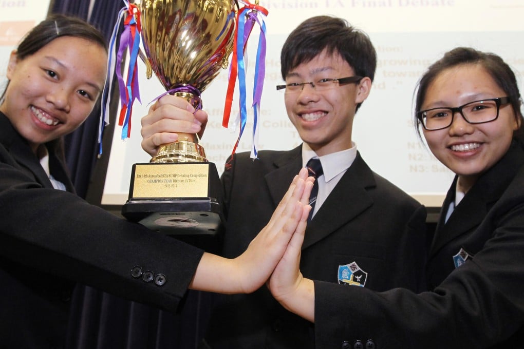 Sarah Tse, Isaac Sham and Natalie Cheung, from Stewards Pooi Kei College in Sha Tin, celebrate their win. Photo: Edward Wong