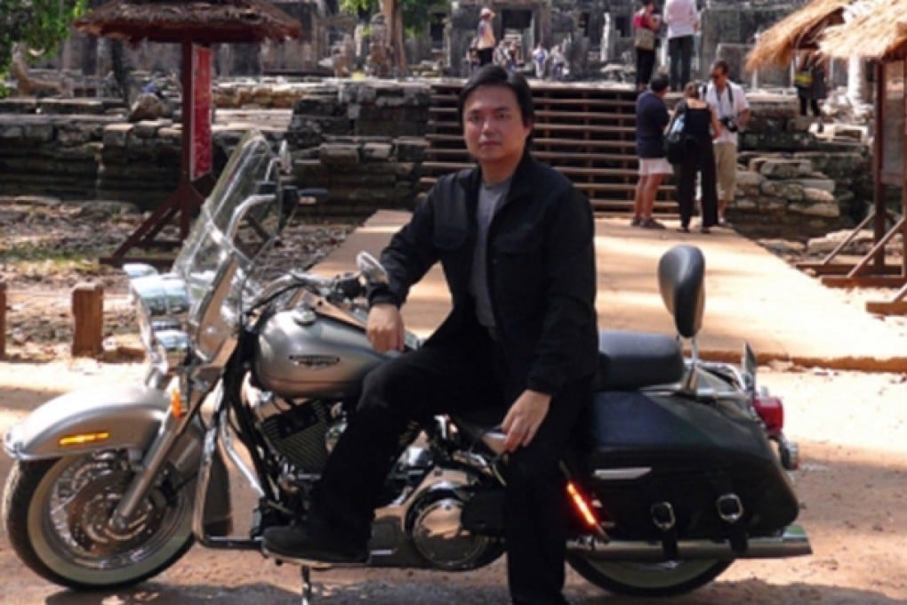 Edward Chin on his Harley.