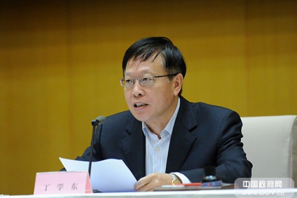 Ding Xuedong, then deputy secretary-general of the State Council, hosts a meeting in Beijing on January 18, 2013. Photo: SCMP