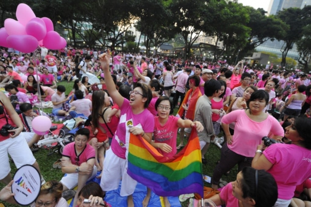 Crowds attend yesterday's Pink Dot gathering. Photo: AP