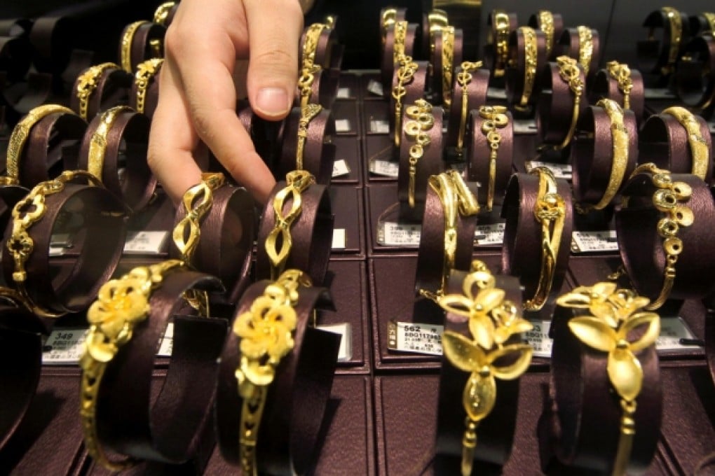 Gold ended June with its biggest quarterly loss in value on record despite a smart 2.3 per cent rally on Friday. From March to June, the price of gold has slid by almost a quarter, its sharpest three-month drop in at least 45 years, spurred by selling amid fears the US Federal Reserve may wind down its stimulus programme. Photo: Dickson Lee