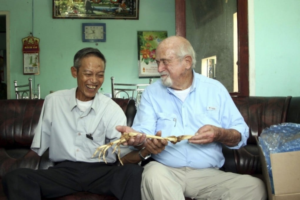 The two veterans are reunited after a Vietnamese journalist wrote an article last year about Axelrad's search for Hung. Photo: AP