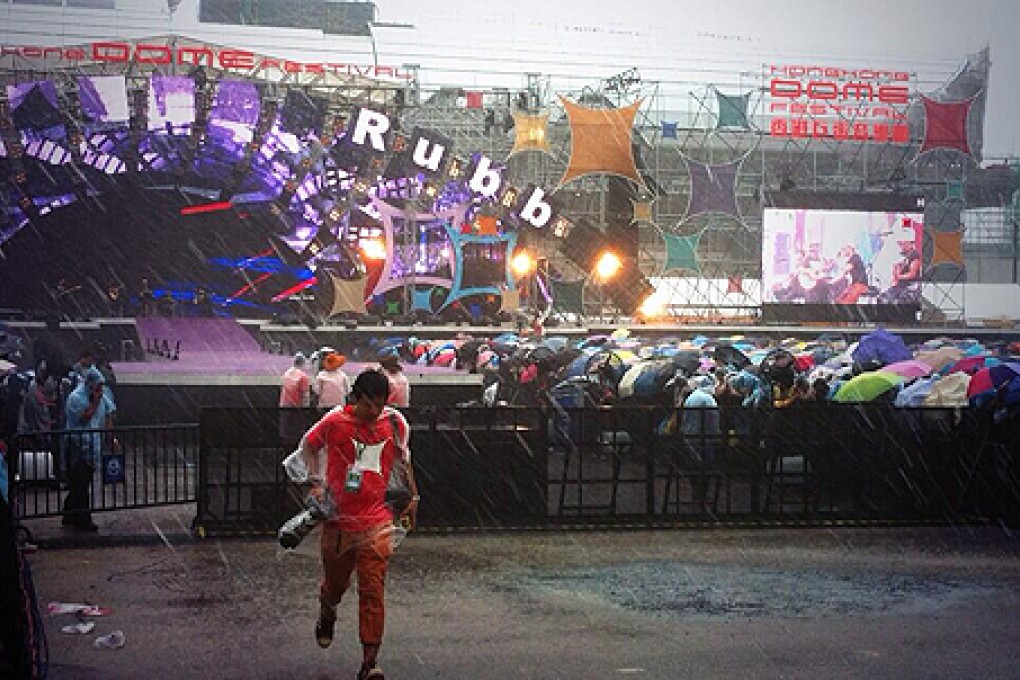 Thousands watch the concert amid the rain. Photo: Vivienne Chow