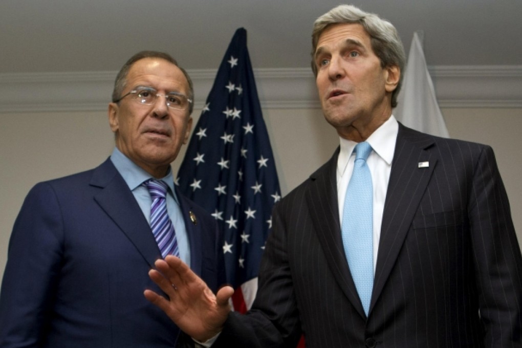 John Kerry (right) deflects a question on Edward Snowden at a news conference with Russian Foreign Minister Sergey Lavrov. Photo: AP