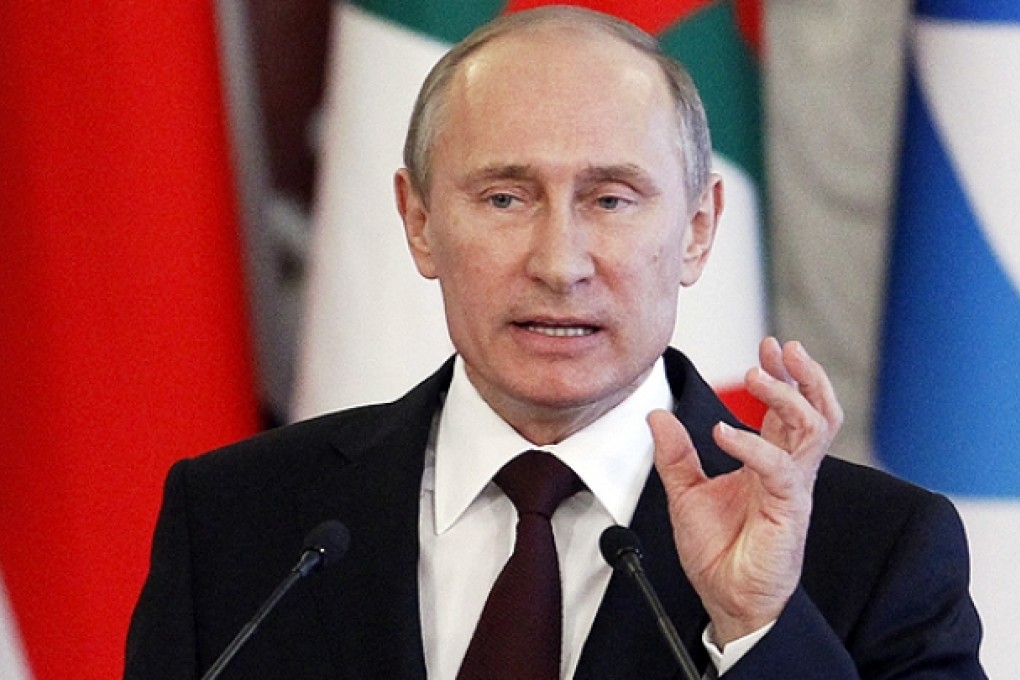 Russia's President Vladimir Putin said on Monday that Russia would not hand former US spy agency contractor Edward Snowden over to the United States but that if Snowden wants to stay in Russia he "must stop his work aimed at harming our American partners." Photo: Reuters