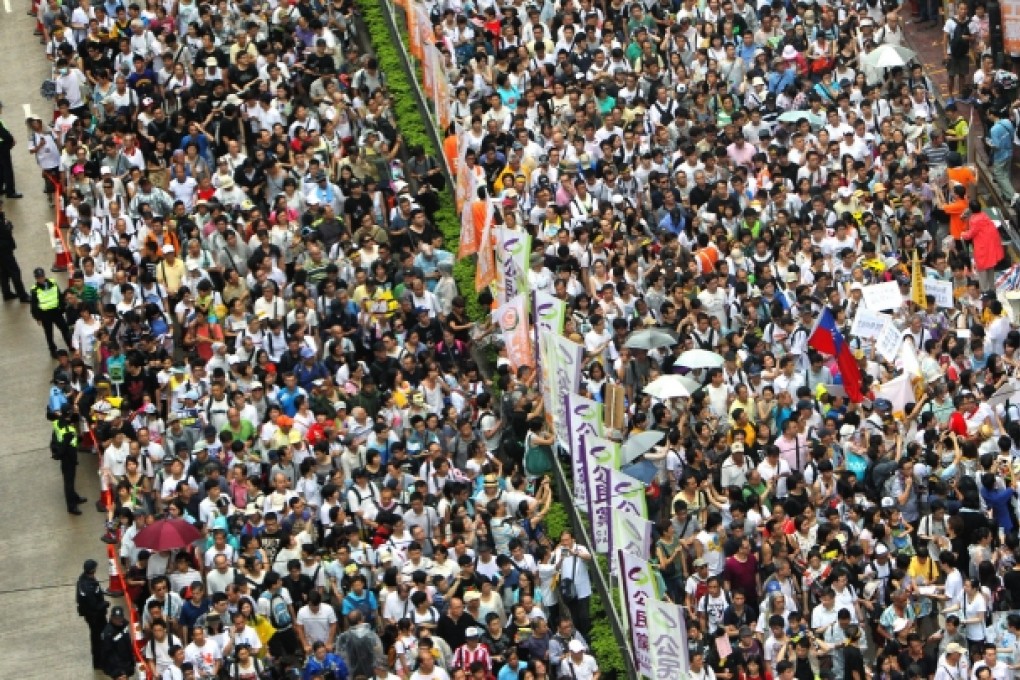 July 1 marchers in Causeway Bay. Photo: Felix Wong