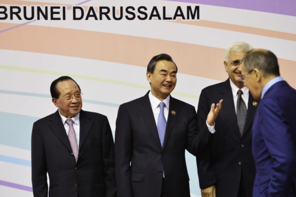 China's Wang Yi with Cambodia's Hor Namhong, India's Salman Khurshid and Russia's Sergey Lavrov in Brunei. Photo: Reuters