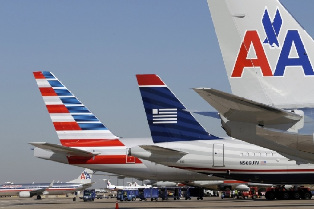 Opposition to the planned American Airlines-US Airways merger is mounting. Photo: AP