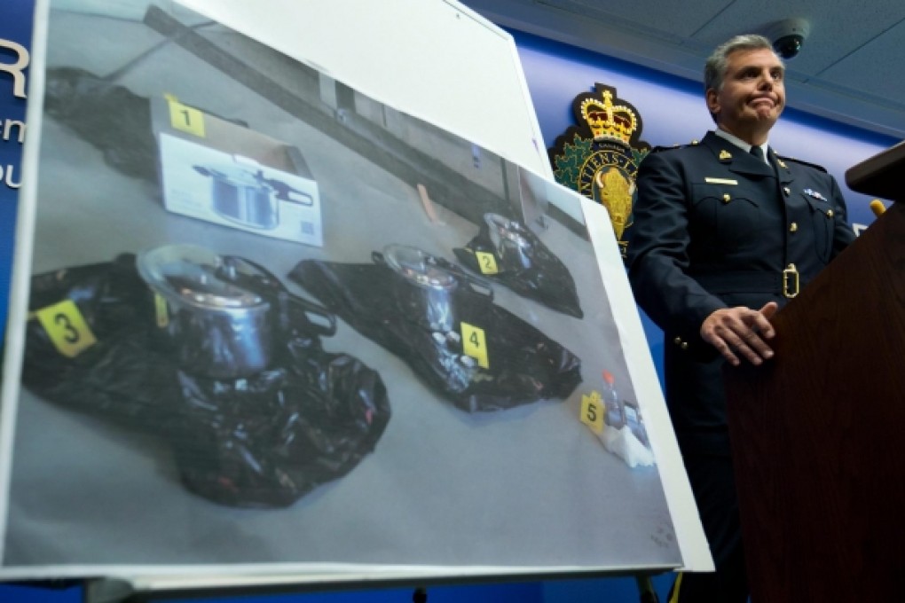 Assistant commissioner Wayne Rideout fields questions on thwarting an attack targeting the legislature in British Columbia. Photo: AP