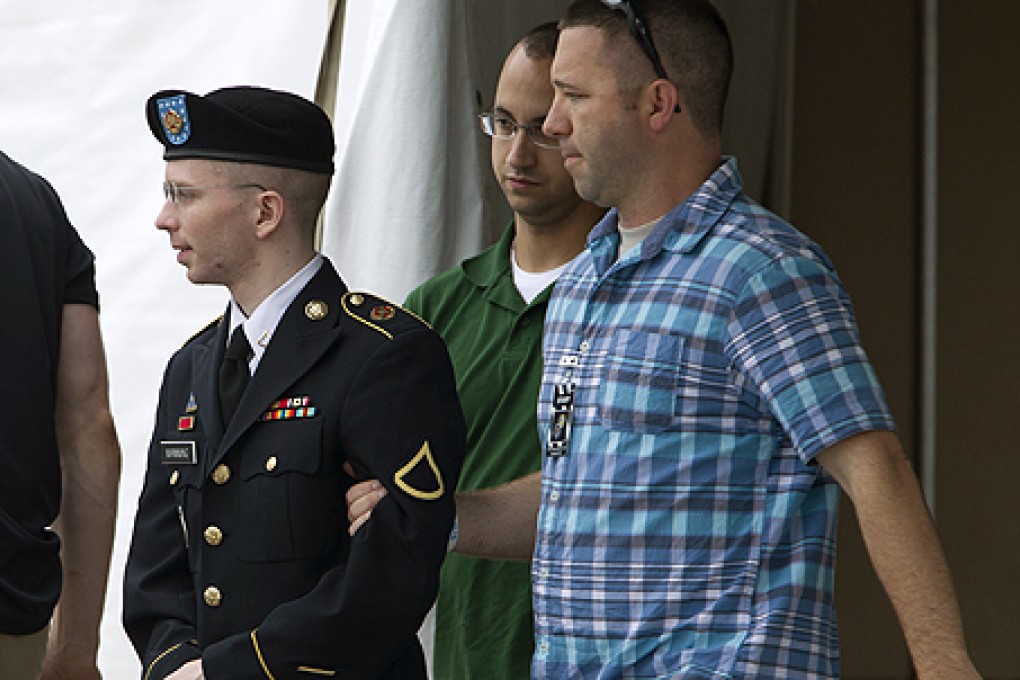 US Army Private First Class Bradley Manning leaves the courthouse in Fort Meade, Maryland. Photo: AP