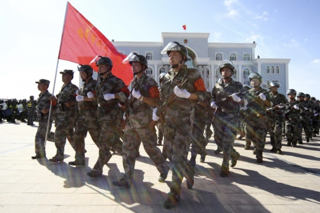 Chinese militia take part in an anti-terrorism joint exercise in Hami, Uygur Autonomous Region. Photo: Reuters