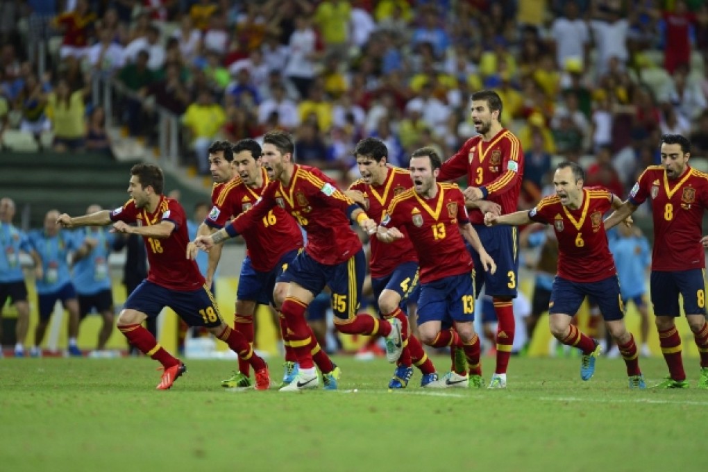 Spain celebrate their penalty shootout victory against Italy in the Confederations Cup semi-final in Fortaleza. Photo: AFP