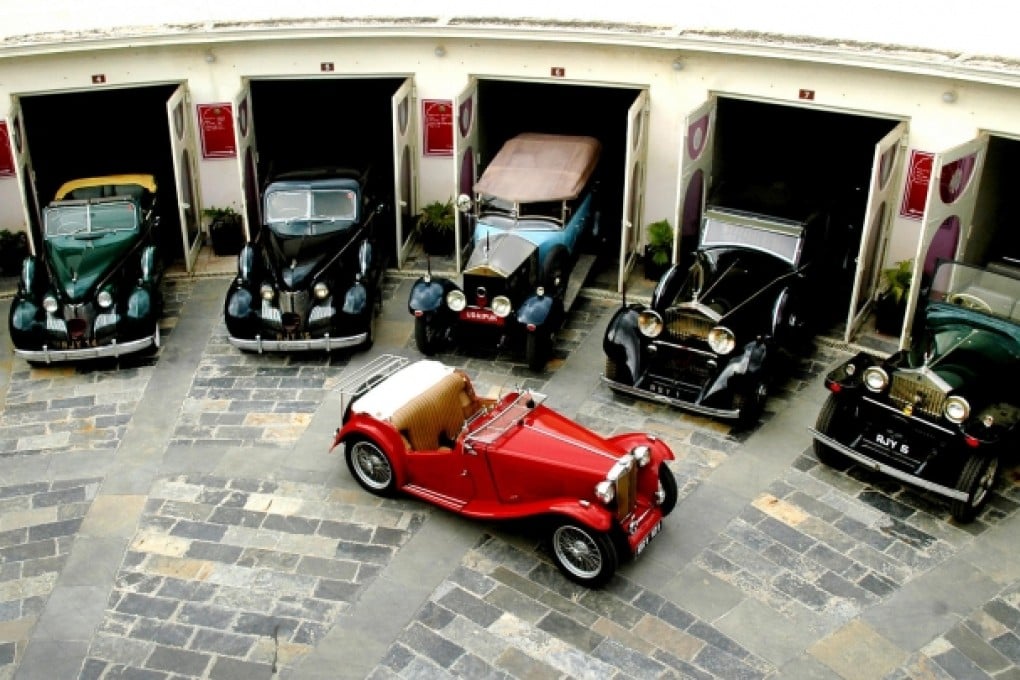 Some of the stately vehicles on display at the Vintage and Classic Car Museum at the Garden Hotel in Udaipur, India.