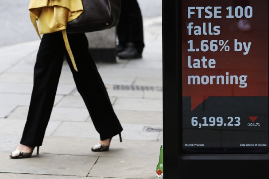 Britain's benchmark FTSE 100 index was among the stocks that fell as a political crisis in Portugal hit equity markets. Photo: Reuters