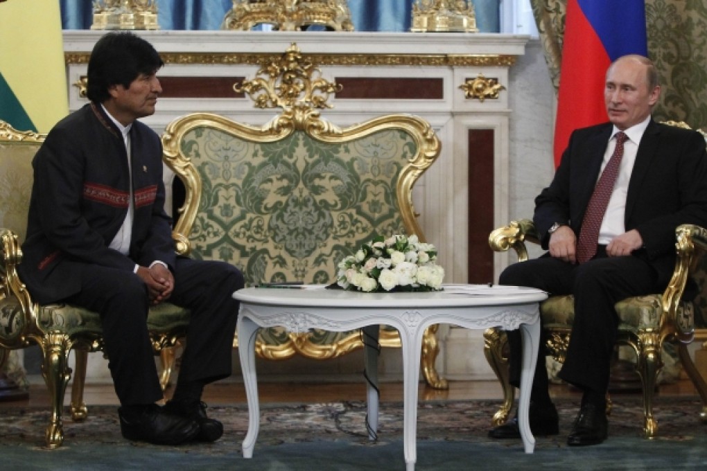 Russia's President Vladimir Putin speaks with his Bolivian counterpart Evo Morales in Moscow. Photo: AFP