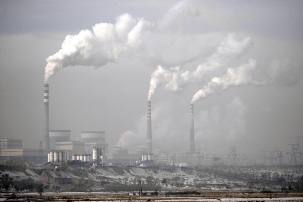 Choking pollution in northern China earlier this year, much of it blamed on coal-fired power plants such as this one in Shanxi, is a reminder of the need for action. Photo: AP