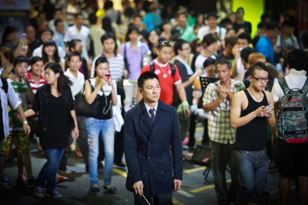 Andy Lau (above, centre) plays a blind private eye who teams up with young cop Sammi Cheng to solve cold cases.
